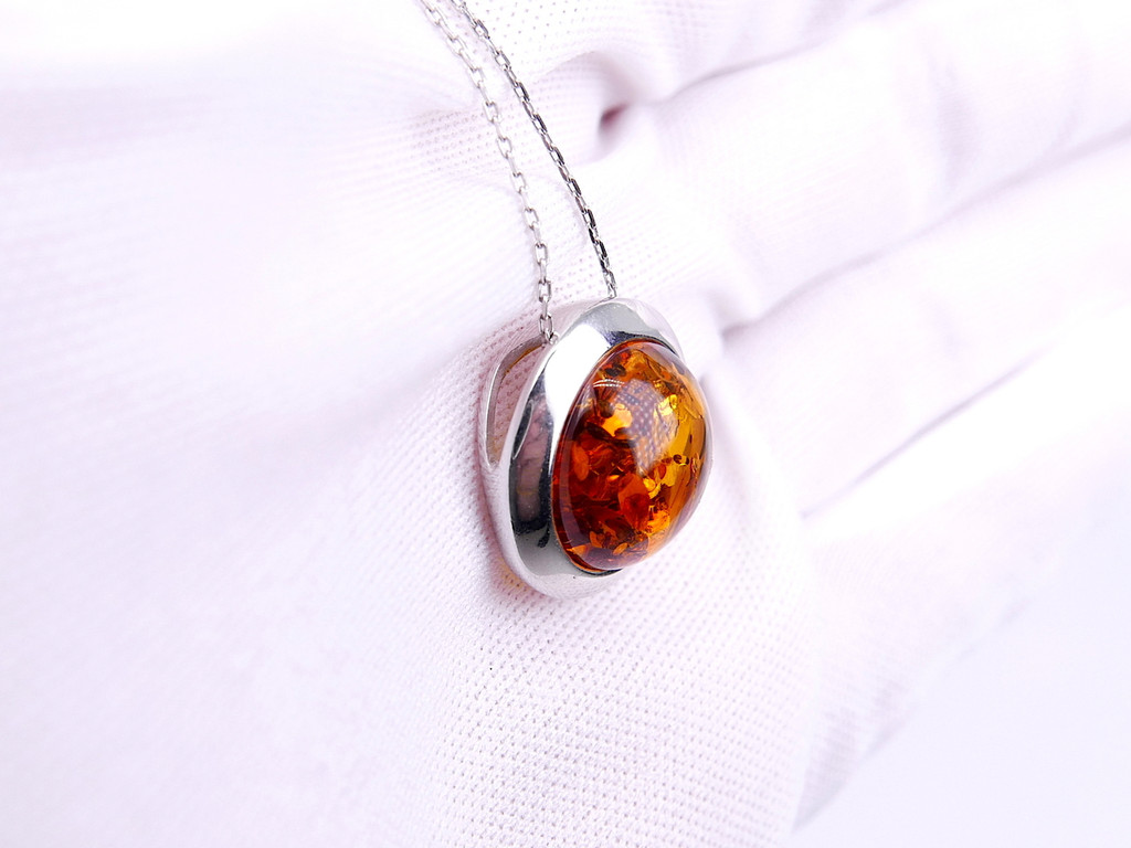 Baltic amber round moon shape silver pendant