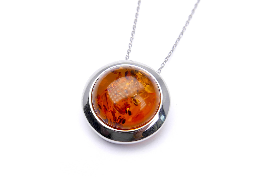 Baltic amber round moon shape silver pendant