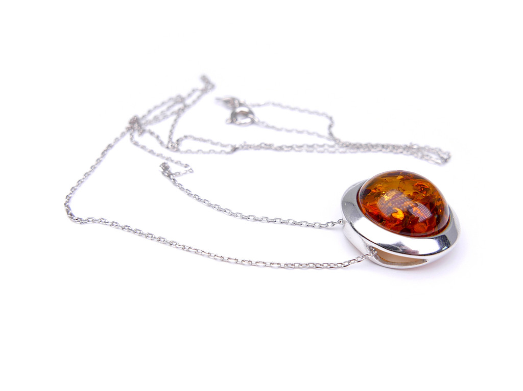 Baltic amber round moon shape silver pendant