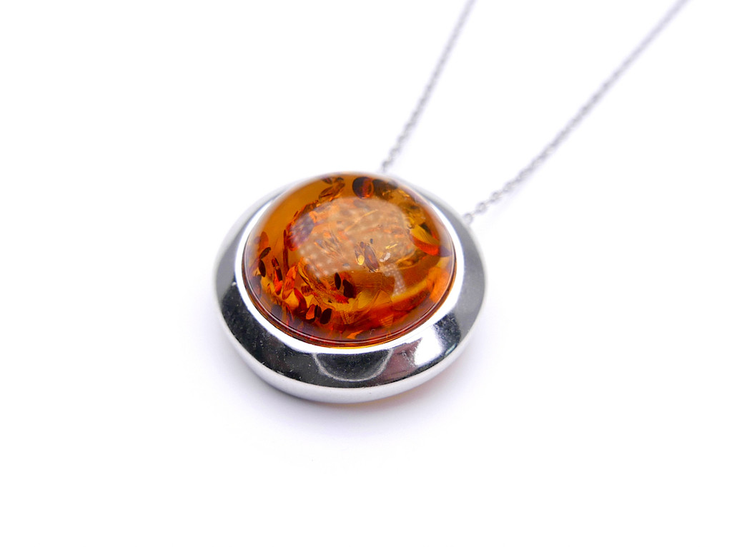 Baltic amber round moon shape silver pendant