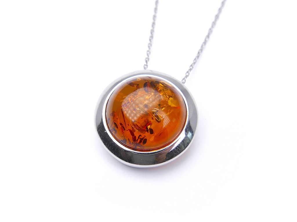 Baltic amber round moon shape silver pendant