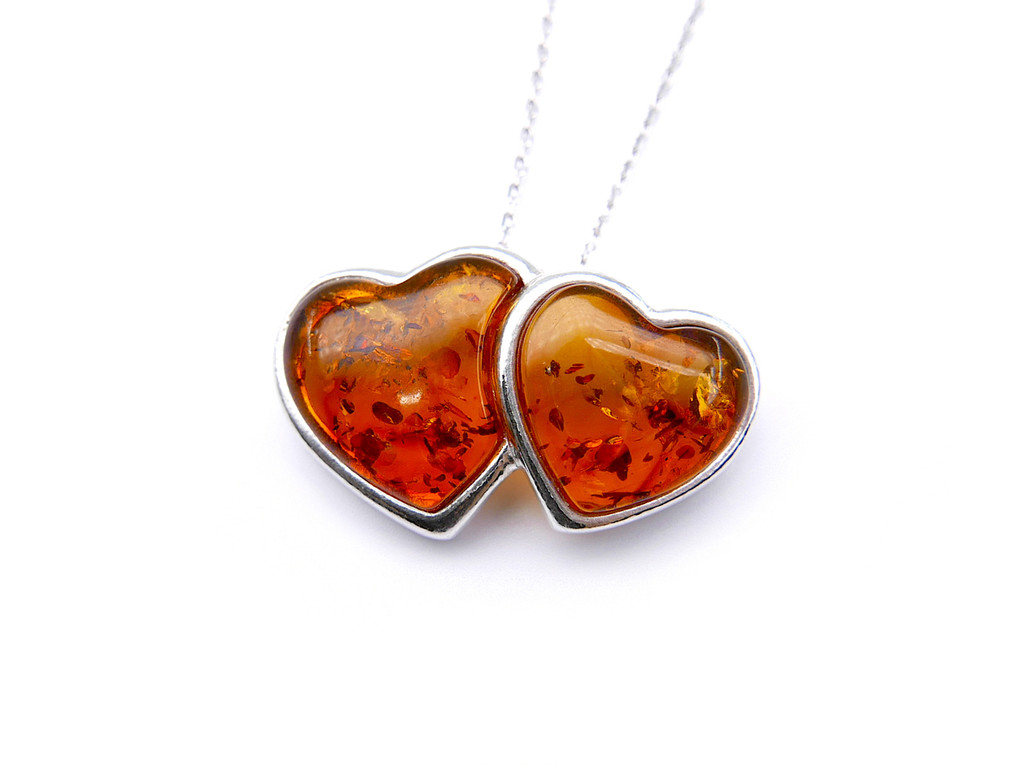 Baltic amber Double Heart pendant mounted in sterling silver