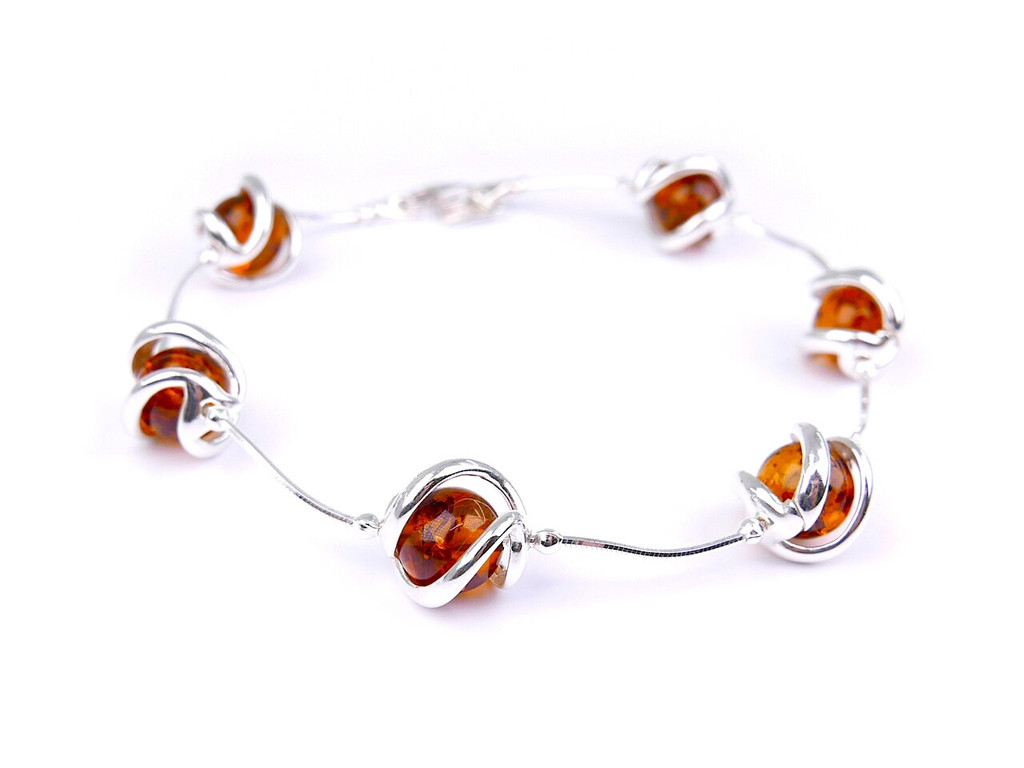 Baltic amber spheres bracelet in sterling silver