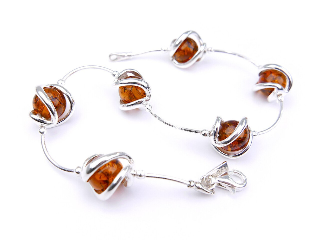 Baltic amber spheres bracelet in sterling silver