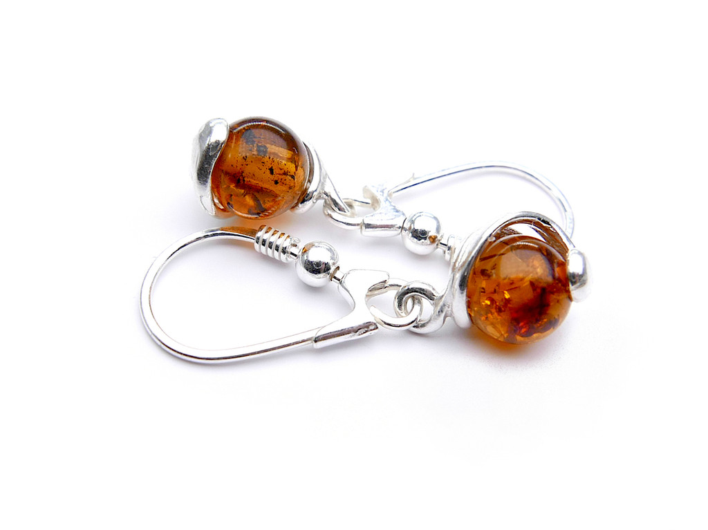 Baltic amber spheres dangle earrings in sterling silver