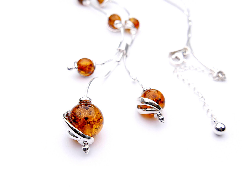 Baltic Amber Necklace: Adjustable Sterling Silver Swirl Drop Design