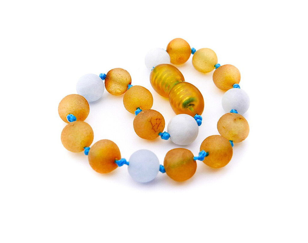 detailed view of genuine Baltic amber beads with aquamarine gemstones children’s anklet