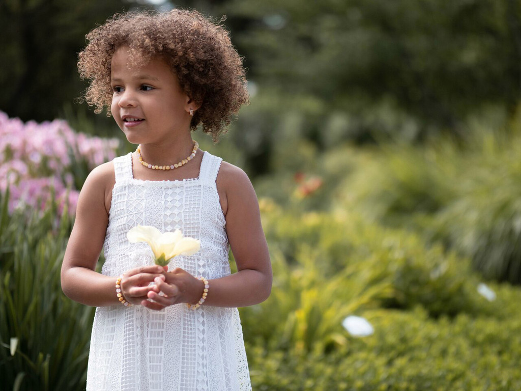 Unpolished Baltic amber and matte rose quartz teething bracelet for children with secure screw clasp