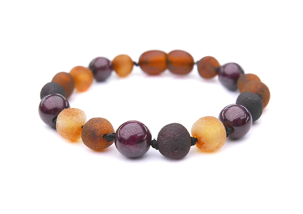 Natural Baltic amber teething bracelet or anklet for children with garnet gemstones lightweight comfortable and handmade in the Baltic States
