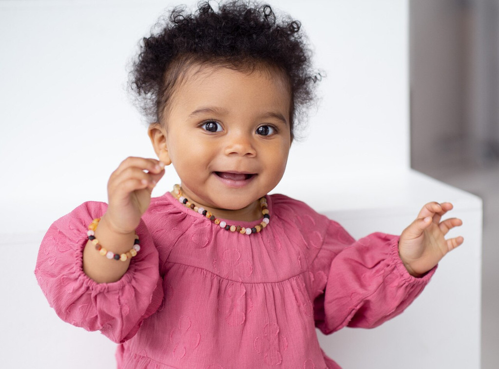 Natural unpolished amber necklace and bracelet teething set with colourful baroque beads for everyday wear 