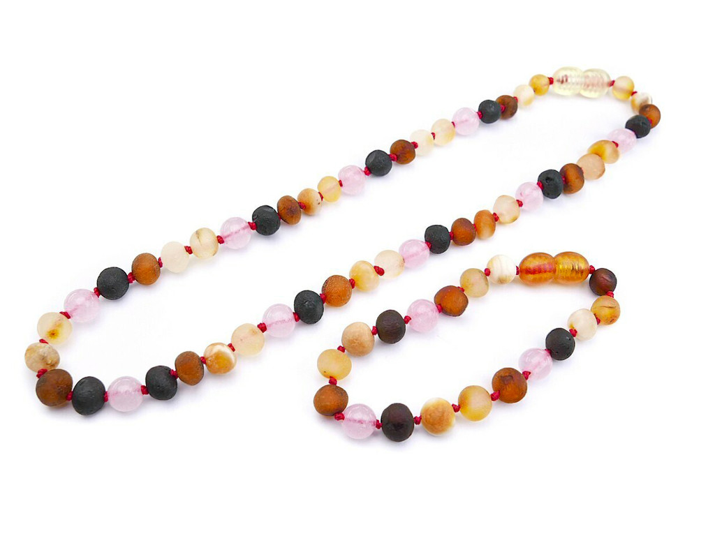 Eco-friendly Baltic amber jewellery set with multicoloured unpolished beads and quartz details - classic teething style design