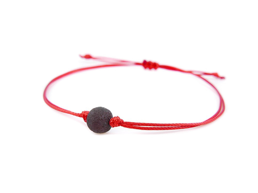 Red string bracelet with dark cherry raw amber bead