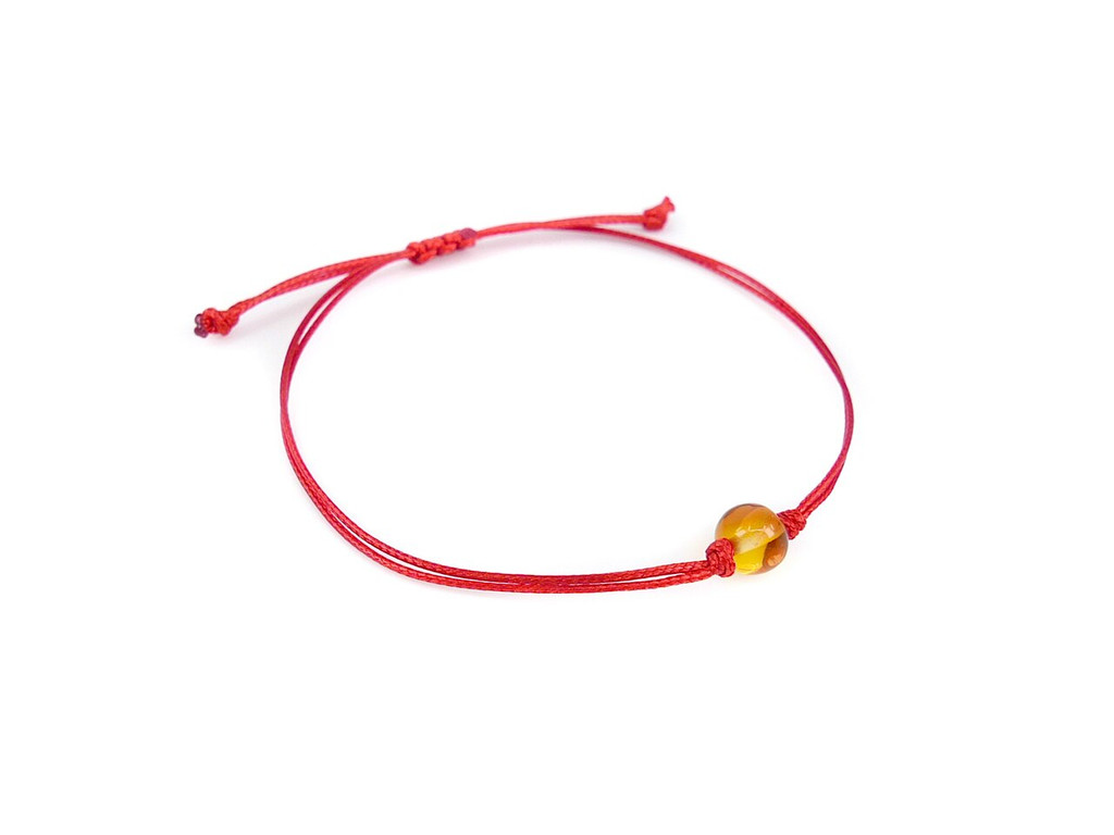 Red String Kabbalah Bracelet with honey polished amber bead