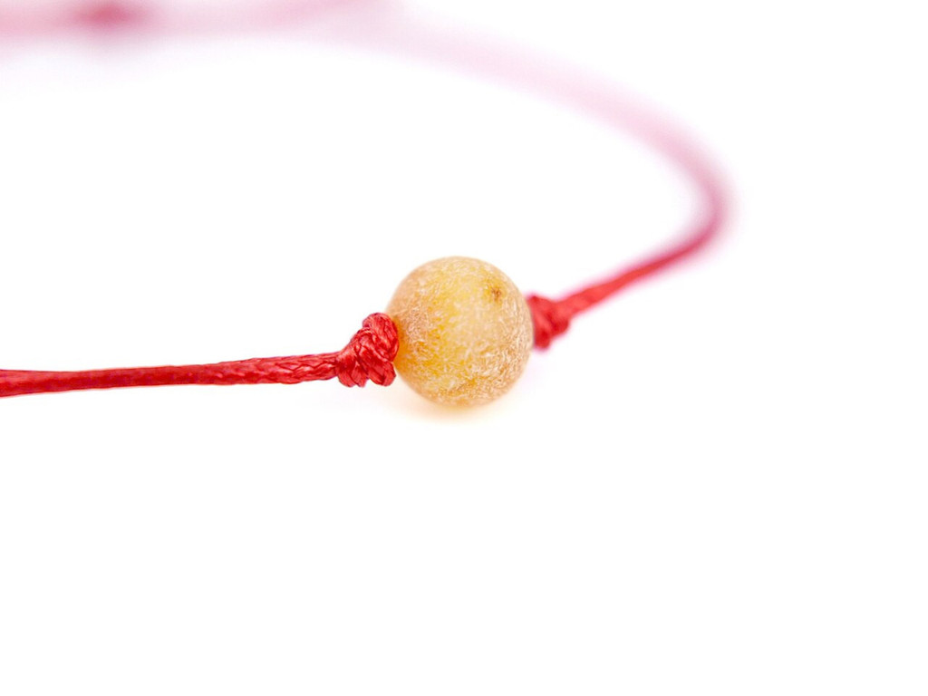 Red String Kabbalah Bracelet with honey raw amber bead