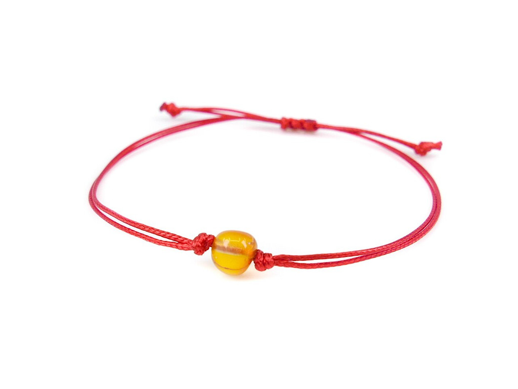 Kids Red String Kabbalah Bracelet with honey polished amber bead