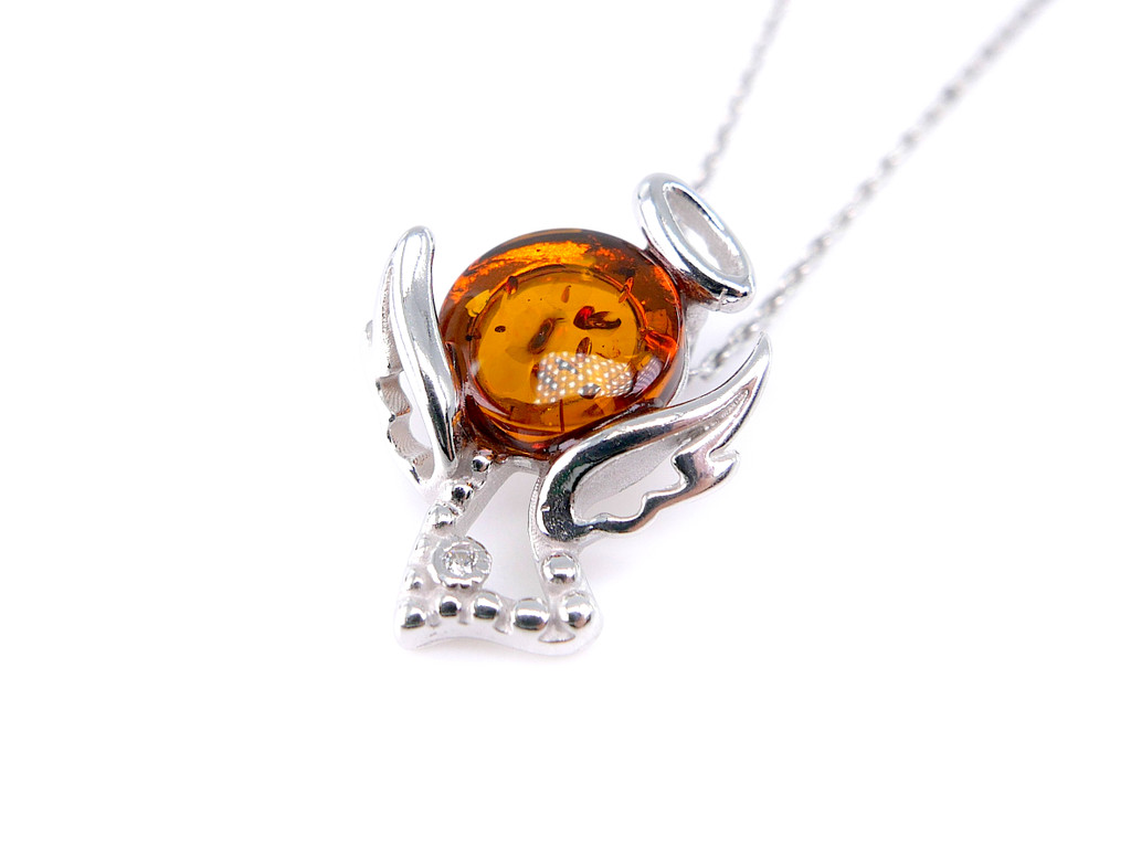 Baltic amber angel pendant in sterling silver