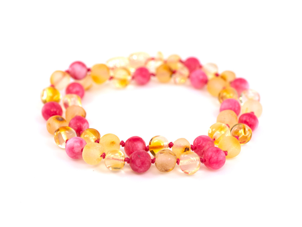 Pink amber teething necklace for kids