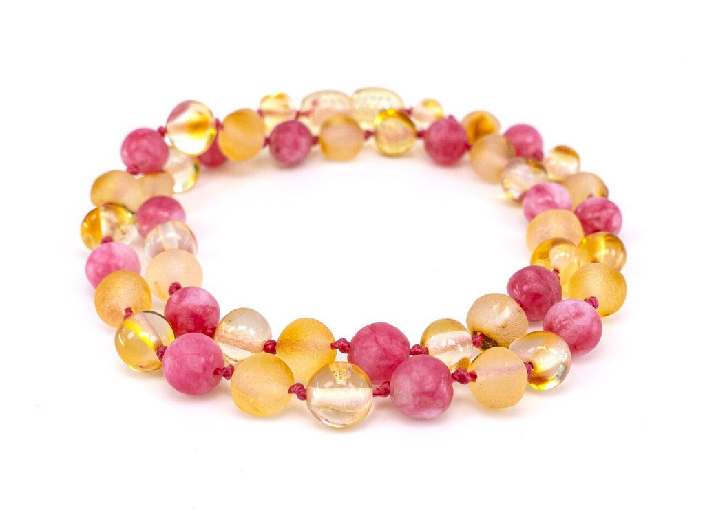 Pink amber teething necklace