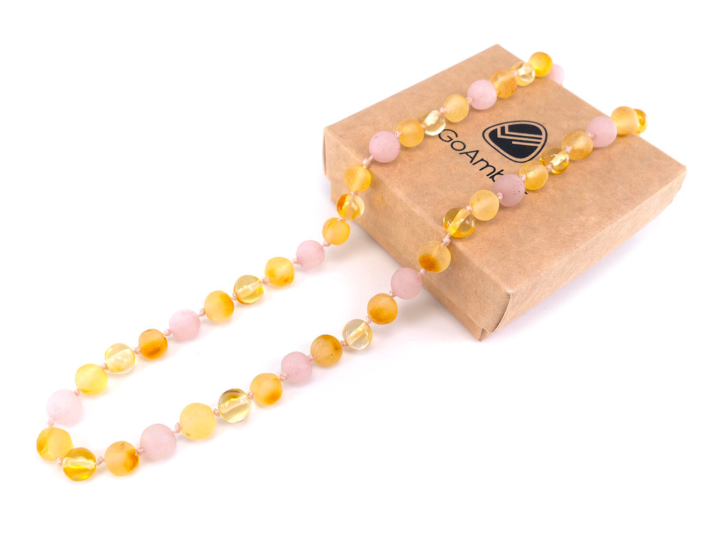 Pink amber teething necklace 