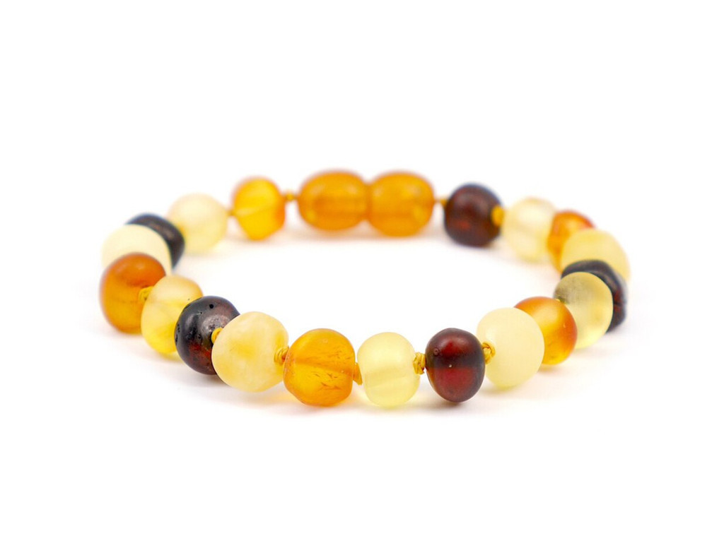 Natural Baltic amber anklet for kids with raw nuggets earthy design and individually knotted beads for durability