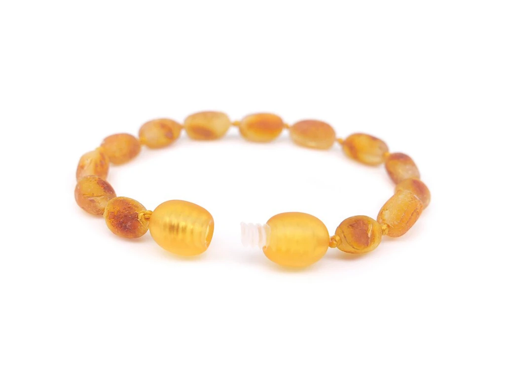 Handmade Baltic amber teething bracelet or anklet for kids crafted from natural raw amber with authentic honey tones
