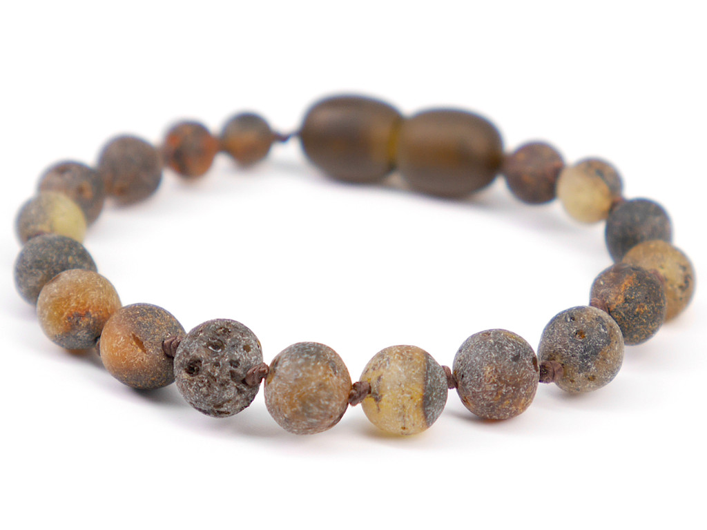 Raw unpolished grey Baltic amber bracelet or anklet for children featuring earthy tone and natural organic style