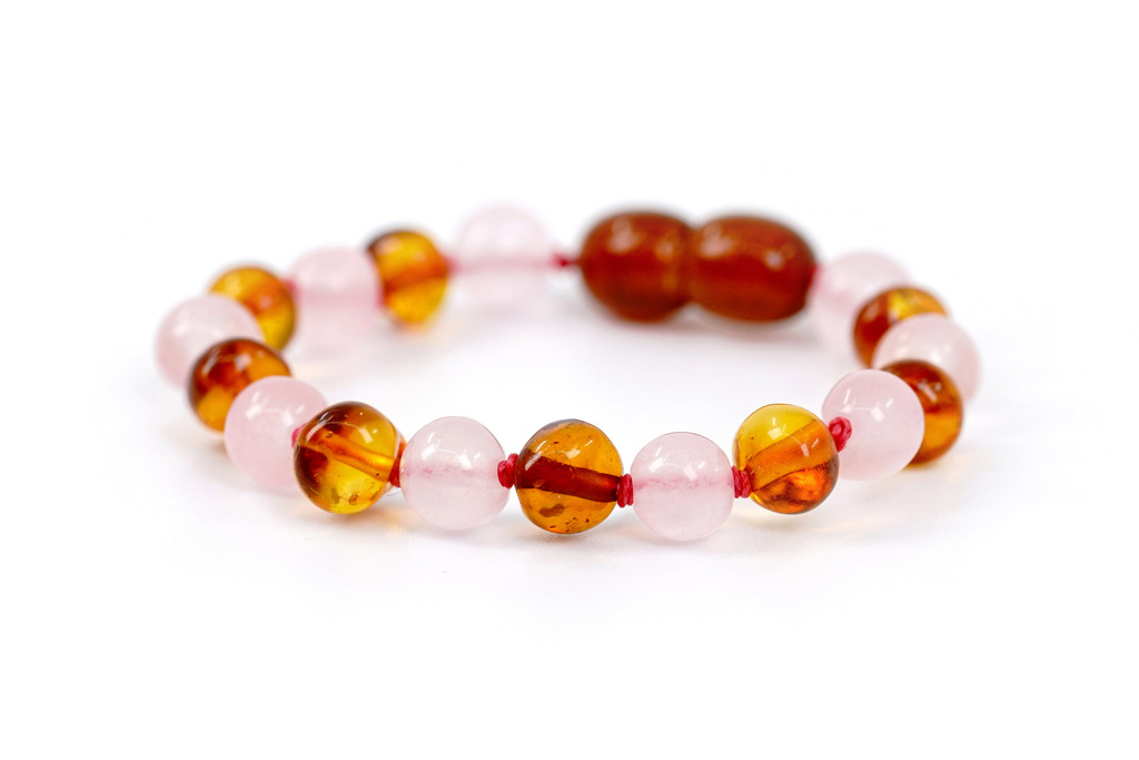 Newborn amber teething bracelet and anklet with polished pink rose quartz for colic and reflux relief