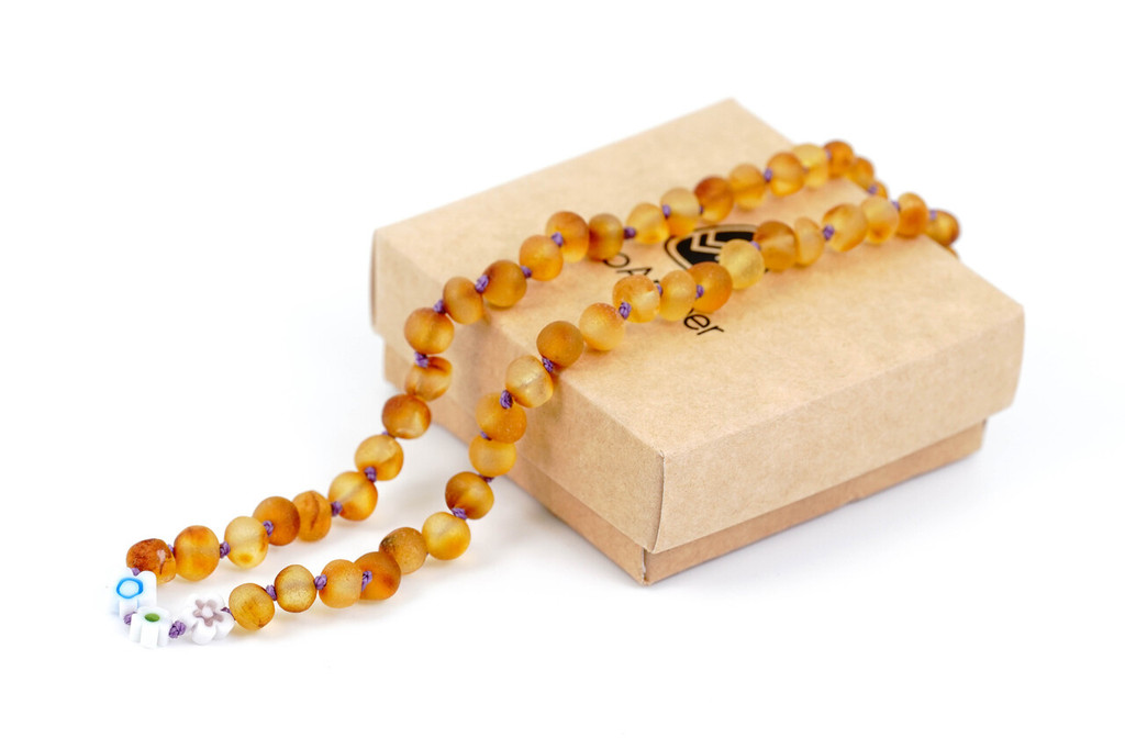 Amber teething necklace with colourful flower-shaped decorative beads