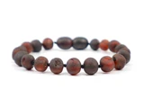 Dark cherry raw Baltic amber teething bracelet or anklet for children – handcrafted genuine amber jewellery available across the UK & Ireland 
