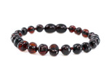 Handcrafted children’s Baltic amber teething anklet – dark cherry gemstone colour 
