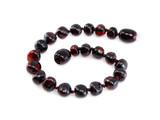 Children’s teething bracelet made from genuine dark cherry Baltic amber beads