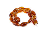 Amber bracelet and anklet for girls handmade natural Baltic amber jewellery available in Ireland and the UK featuring a classic teething style design