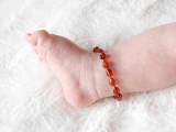 Cognac Baltic amber teething anklet for kids, handmade natural amber jewellery from the GoAmber children’s collection available in the UK, Ireland, Canada, Australia & USA