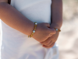 Amber teething set with matte aquamarine
