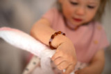 Amber teething set with amethyst