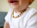 Genuine Baltic amber teething necklace featuring polished multicoloured baroque beads 