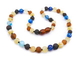 Natural Baltic amber necklace featuring raw nugget beads in mixed colours with blue agate stones