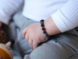 Adjustable blue string amber teething, colic and reflux bracelet or anklet for babies online shop United Kingdom & Ireland