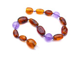 Baltic amber teething bracelet with amethyst beads – natural children’s jewellery