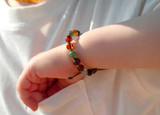 Adjustable amber teething bracelet UK. Also good for reflux, colic and children sleeping