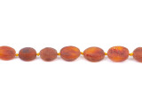 Natural unpolished cognac amber teething necklace with knotted olive beads for babies