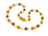 Lightweight teething amber necklace with raw multicoloured rounded Baltic amber beads