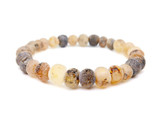 Amber bracelet for adults handcrafted from raw unpolished grey Baltic amber beads. A natural and stylish accessory made from genuine Baltic amber