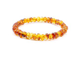 Honey amber bracelet for adults, genuine Baltic amber gemstone jewellery handcrafted in the Baltic region and available in the UK & Ireland