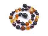 Amber bracelet for adults with natural Baltic amber and garnet gemstone beads. Handmade certified jewellery for everyday comfort and style