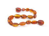 Amber teething bracelet with raw unpolished cognac beads