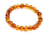 Baltic amber light cognac beaded stretch anklet for baby and child - traditional teething style design