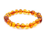 Amber teething anklet for babies cognac rounded beads