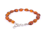 Handcrafted adjustable cognac and olive Baltic amber jewellery – natural anklet or bracelet for teething, made in the Baltic States