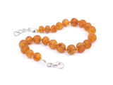 Baltic amber adjustable teething bracelet with raw honey amber nuggets for children and parents